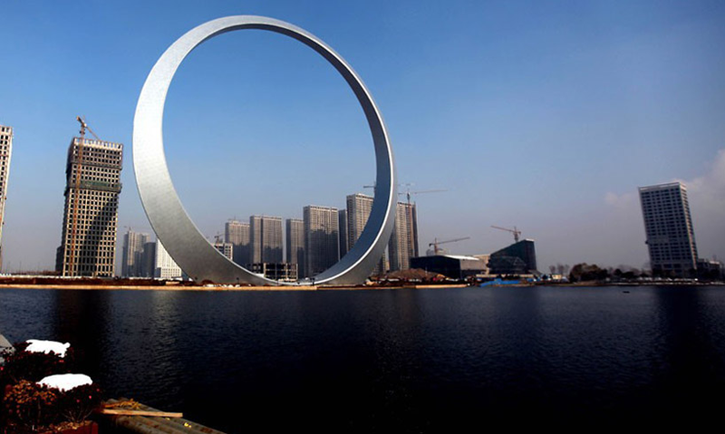 Illustration for article titled These Fantastic Buildings Are Like Wedding Rings For Giants